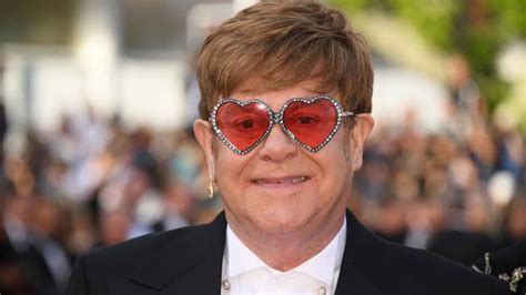 elton john gucci heart sunglasses|Elton John eyes only.